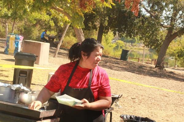 cooking at Taste of Mexico stand at Almaden Valley Art and Wine Festival