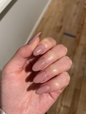 Acrylic tips+gel, but they didn't cut my cuticles