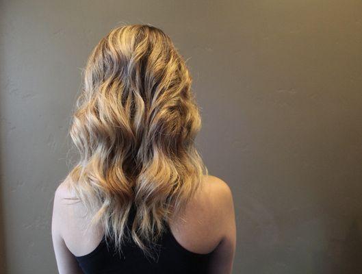 A natural blonde balayage that was previously black and red.