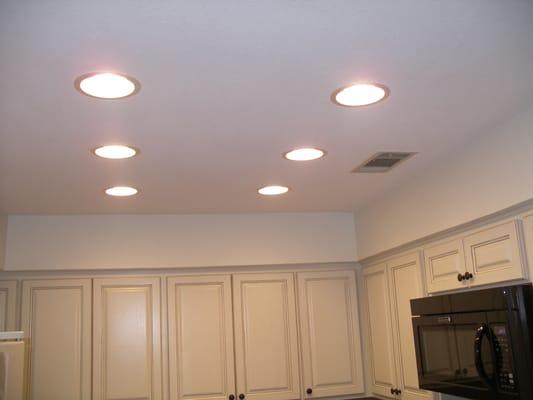 Replace flourescent light fixture with recessed lighting in kitchen