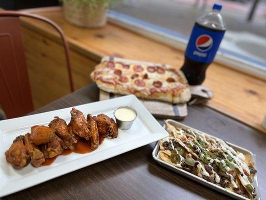 Our special!  Pizza, Wings, Nachos, Ice Cream and Soda $45