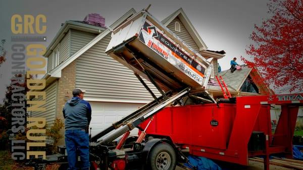 New Roof No Mess Equipter Containing Torn off Shingles