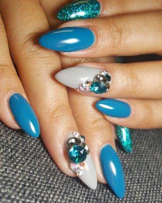 Hard gel sculpted nails with Swarovski Crystals.