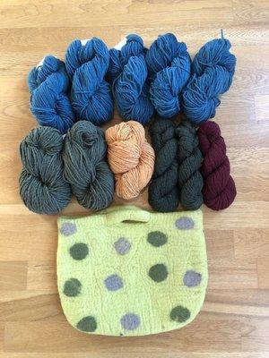 Snagged some sale yarn, a funky felted bag and some more beautifully colored wool yarn to add to my collection!