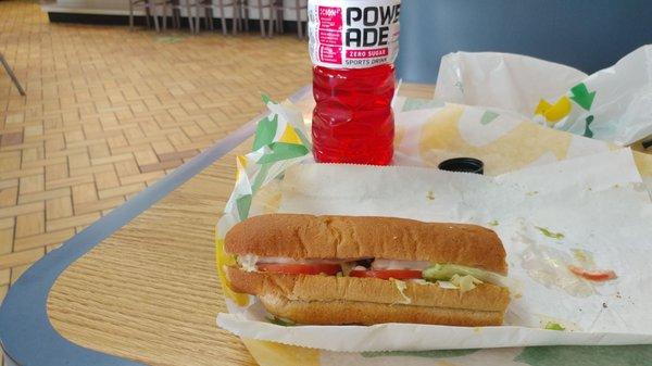 turkey on wheat lettuce tomato Mayo mustard Powerade sugar free fruit Punch bought next door due to no selection.