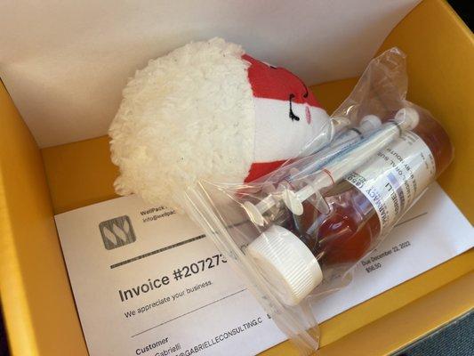 Nicely packaged medicine, personalized note, and cute dog toy