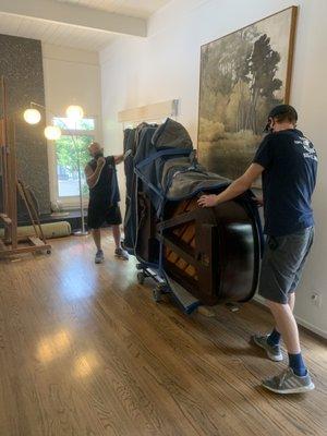 Photo 4: Moving piano into living room