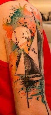 Watercolor sailboat tattoo by Jen Combustya. Still fresh so the colors and shading are slightly darker than they will be when healed.