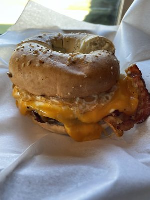 Everything bagel with fried egg, bacon and cheddar