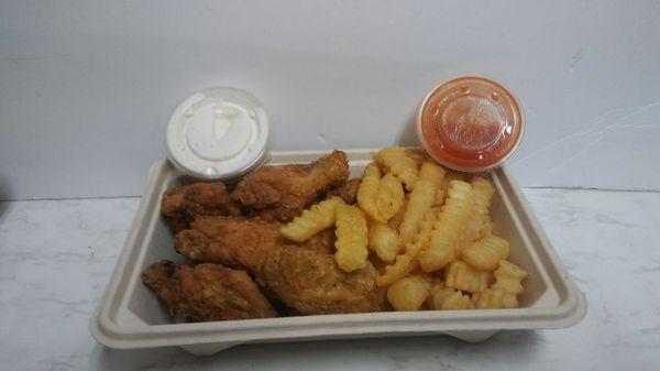 Chicken wings and fries