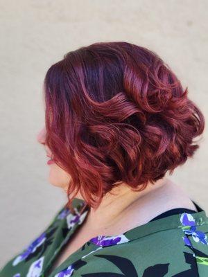 Red all over color and fresh hair cut by Karen