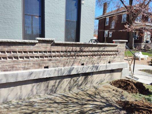 Rustic brick railing installation and concrete porch install.