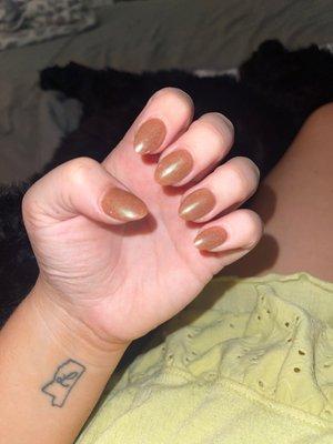 Dip nails with tips on them... brown sugar nail color with chrome finish.