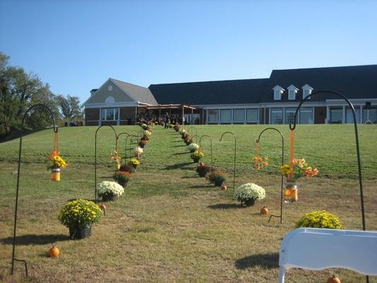 from the rivers edge looking up at the building - October wedding