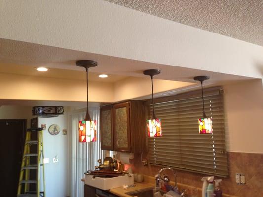 We installed new LEDs to the kitchen and 3 pendants above the bar