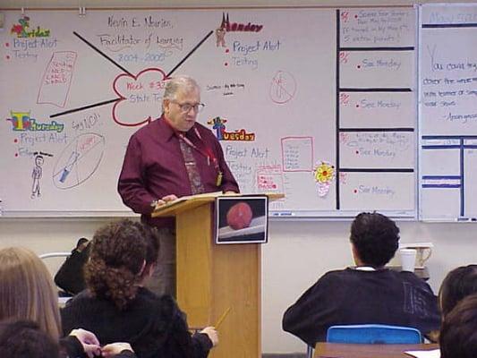 Brian teaching hypnotherapy at a local High School science class.