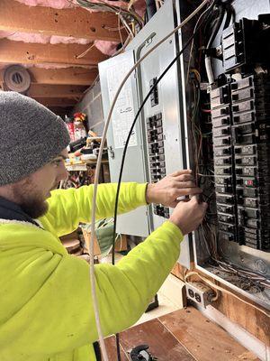 TriCities Electric's technicians bring meticulous focus and skilled hands to every panel, ensuring your home's electrical heart beats strong