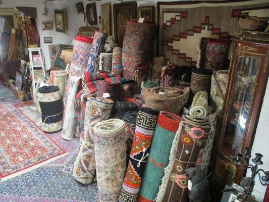 Navajo, Persian and Caucasian rugs.