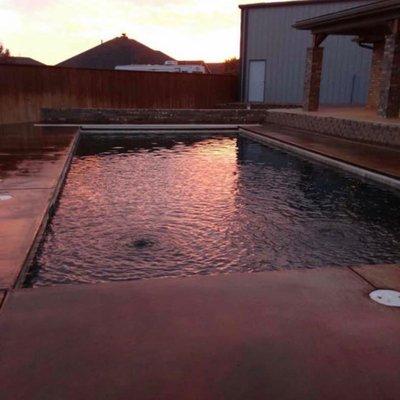 Swimming pool deck. Acid and sealer