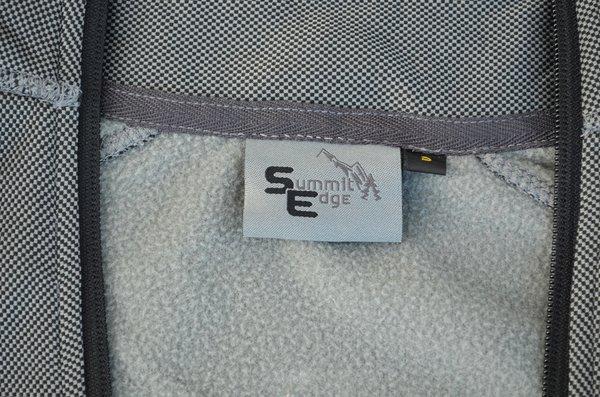 Summit Edge Outerwear brand label.