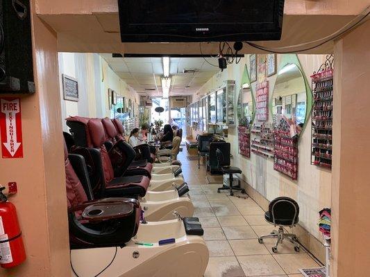 Our inside Salon! Plenty of manicure desk technicians and Spa Pedicure Chairs.