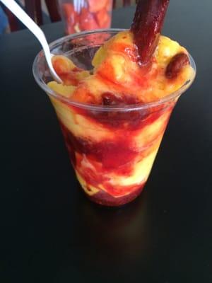 A mangoneado - blend of fresh fruit with ice cream and spicy sauce. Delicious!