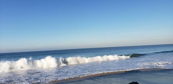 Waves crashing at The Strand Beach in Dana Point, California.