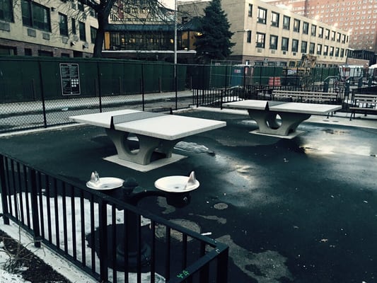 Pong tables with water fountains and benches