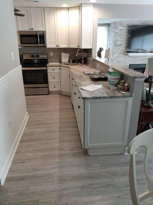 Job that was done where Flooring & counter tops has been installed by us.