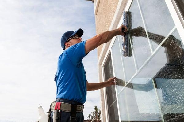 Cleaning windows, washing glass