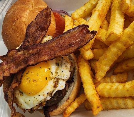 Breakfast Burger, 1/3 pound Angus beef, Bacon American Cheese with  a fried egg On top!