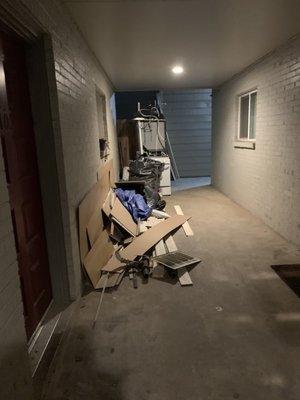 Trash, debris, supplies left in the common area of our condos.