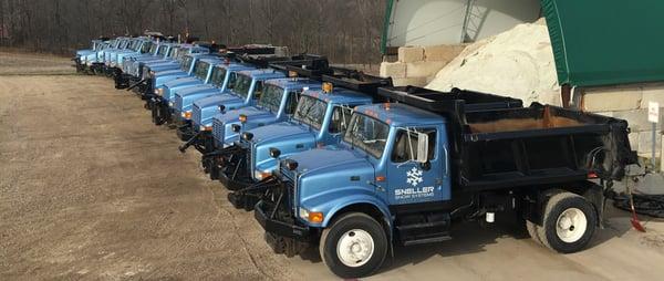 Sneller Snow Systems snow plow trucks for snow removal in Grand Rapids and Lansing MI.