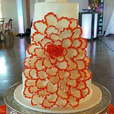 Hand made fondant flower petals to make this cake a show stopper!