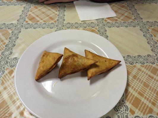 Lentil sambusas - pillowy with a cumin/tumeric ish lentil filling