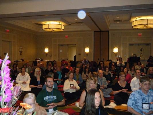 Members of Dr. Chow's class participating in Chow Qigong meditation.