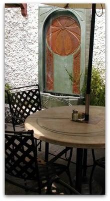 Green Fountain with copper inlay. Concrete tables are a thing to behold