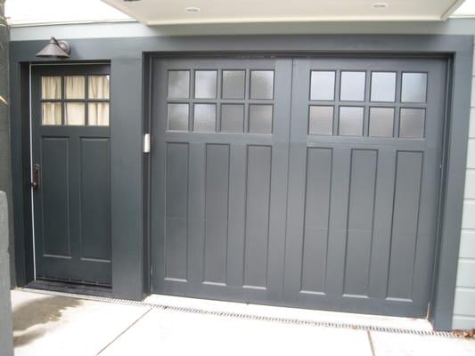 Custom Garage Door: Hand-built by Jack himself.  This one was built to match the side entrance door perfectly!