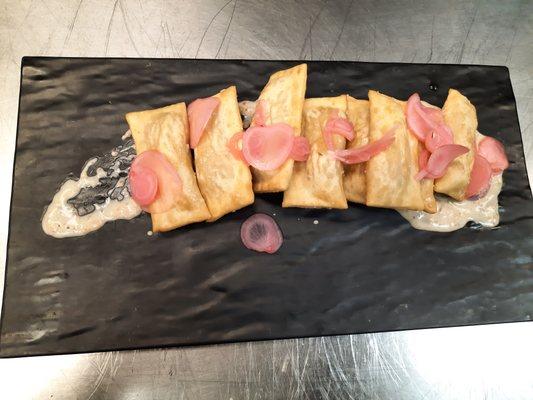 Fried pierogies
Mushroom and potato filling with pickled shallots and radish