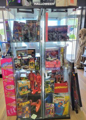 Display case of vintage toys & figures. Six Million Dollar Man, Superman, Knight Rider,Star Wars and much more.