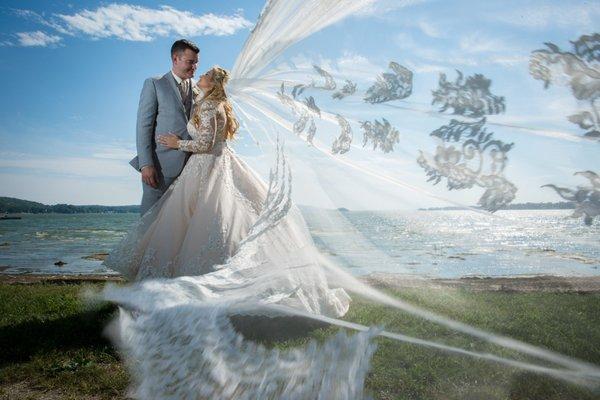 Wedding veil in the wind at a summer wedding in Saint Albans, Vermont