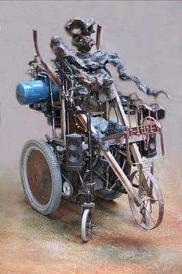 GOBOY, robot beggar by Frank Garvey