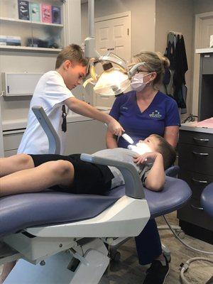 My son was nervous about getting sealants today, so his "big brother" helped in the process. Helped ease his nerves SO much!