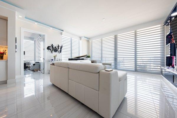 Combine comfort and luxury with Hunter Douglas sheer shades. Their shades filter natural light, bringing a bright and airy feel to any home.