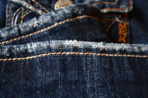 Original hemming on Mek jeans