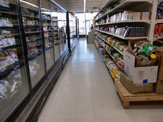 Multiple aisles of Indian and Pakistani desi grocery items at Apna Bazar Zabiha Halal Meat in Owings Mills, MD