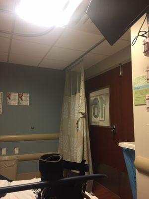 Sloppy appearance of curtain in ER room 16