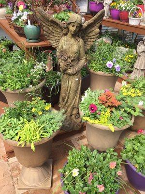 Garden statuary and clay pots are among Sunnyfield's special offerings.