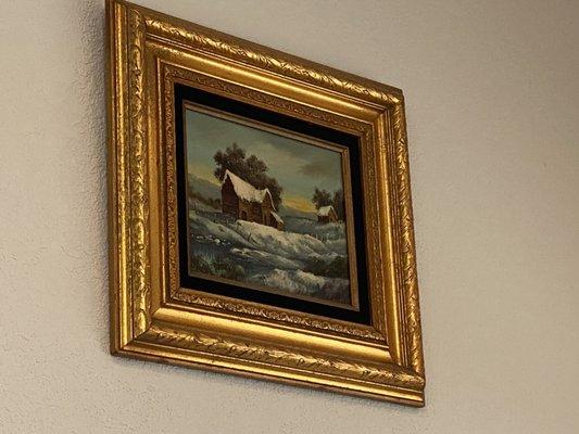 The only decorations are original paintings in gilded frames, all landscapes with a few still-lifes.