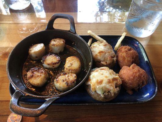 Seared scallops with stuffed mushrooms